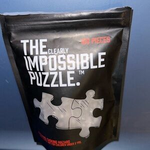 The Clearly Impossible Puzzle. 100 pieces. All clear!! So fun!